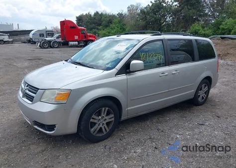 2010 Dodge Grand Caravan Sxt z USA, uszkodzony, nr VIN 2D4RN5DX1AR123443
